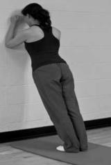 Safe and Easy Stretches (continued) q Heel Cord (Achilles) Stretch 1. Stand facing a wall an arm s distance away, with your knees straight and your heels flat on the floor. 2.