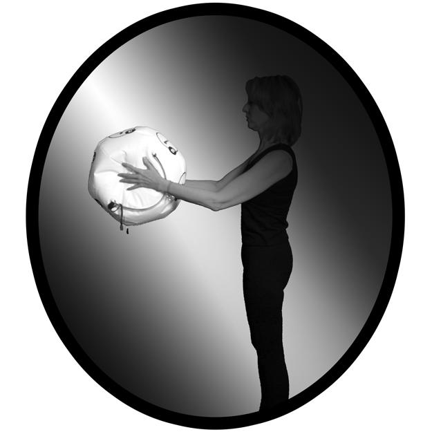 BEGINNING SHOULDER CIRCLES 1. Stand in a chin-in, pelvic pinch position. 2. Hold the OsteoBall waist height with the palms of your hands on either side of the OsteoBall. 3.
