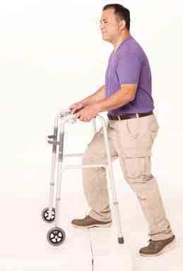 Keeping your back straight, lean on the walker so it supports your weight. Step into the center of the walker with your operated leg, being careful not to twist your leg.