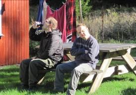 Figure 31 Two DeafBlind men sitting in a bench