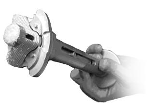 Impact until the instrument bottoms out on the handle stop (Fig. 14, inset).