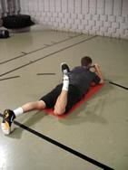 Quad (Band) Stretch Lay flat on your stomach with the band around your