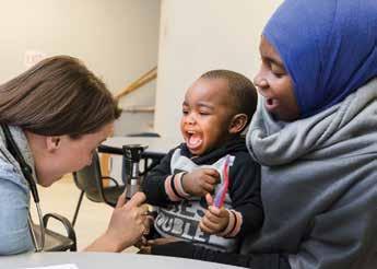 200 children received free medical and dental care at CHOP Night clinics through the Homeless Health Initiative (HHI) Carter and his mother at an HHI clinic 30 medical interpreters on staff providing