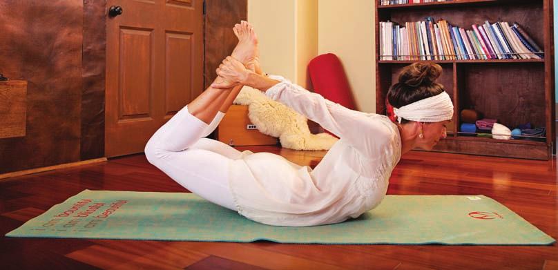 2) Rocking Bow: Lie on the stomach and assume Bow Pose: Reach back and take hold of the ankles stretching up by creating a tension between the arms and legs.