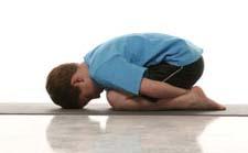 Child s Pose Warms Up: Shoulders Hips Back Knees From all fours, sit back on heels, drop belly towards thighs and head towards mat Place forehead on floor Keep arms extended, stretching hands forward