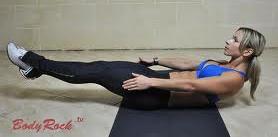 Simultaneously, raise knees and torso until hips and knees are flexed bringing arms around legs.