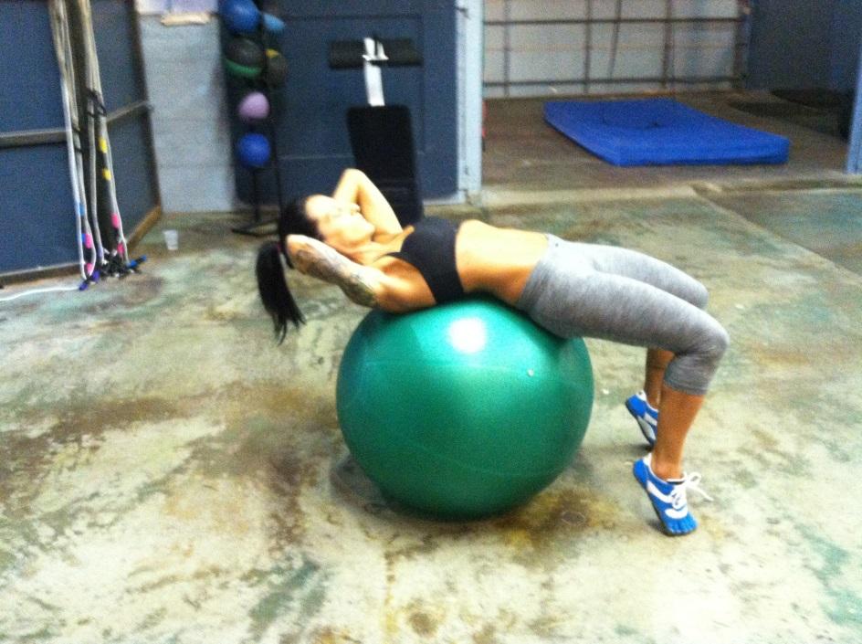 Variation 2: Lay across the exercise ball, with it positioned just above your glutes.