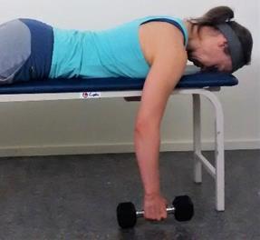 Arm abduction Movement: On a bench keep a light weight in the hand. The arm hangs next to the bench.
