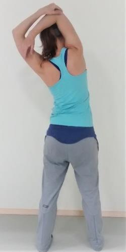 Place the forearms on the wall above the shoulders. Keep the beck straight. Hold the stretch 30 seconds.