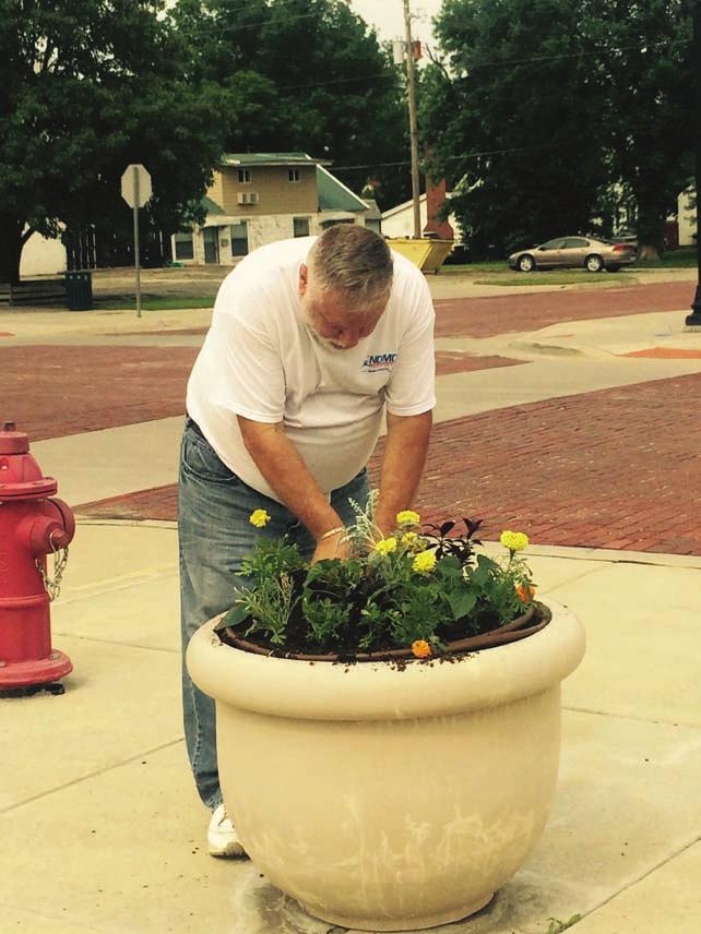 President, planted pots Thursday evening, May 29 at the corner by Williamson Plumbing in