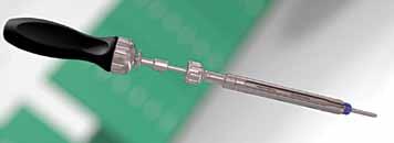 Pedicle Screw Placement Connect the Ratcheting Axial Handle to the Screw Driver. Place the Screw Driver into the Screw Extension.