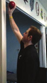 You may begin initially, with ball at shoulder height and slowly move ball up wall as you gain