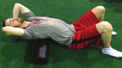 Go back and forth for 3-5 min. THORACIC EXTENSION Lay over the foam roller with arms supporting the head.