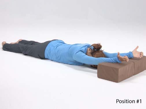 4. Floor Block Hold this E-cise for 01 min. 1. Lie on your stomach with your forehead and nose flat on the floor.