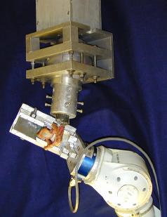 robotic manipulator through a universal force-moment sensor (UFS, JR-Woodland, CA Model 4015) while the clavicle was rigidly fixed to the base of the robotic/ufs testing system (Unimate-Dunbar,
