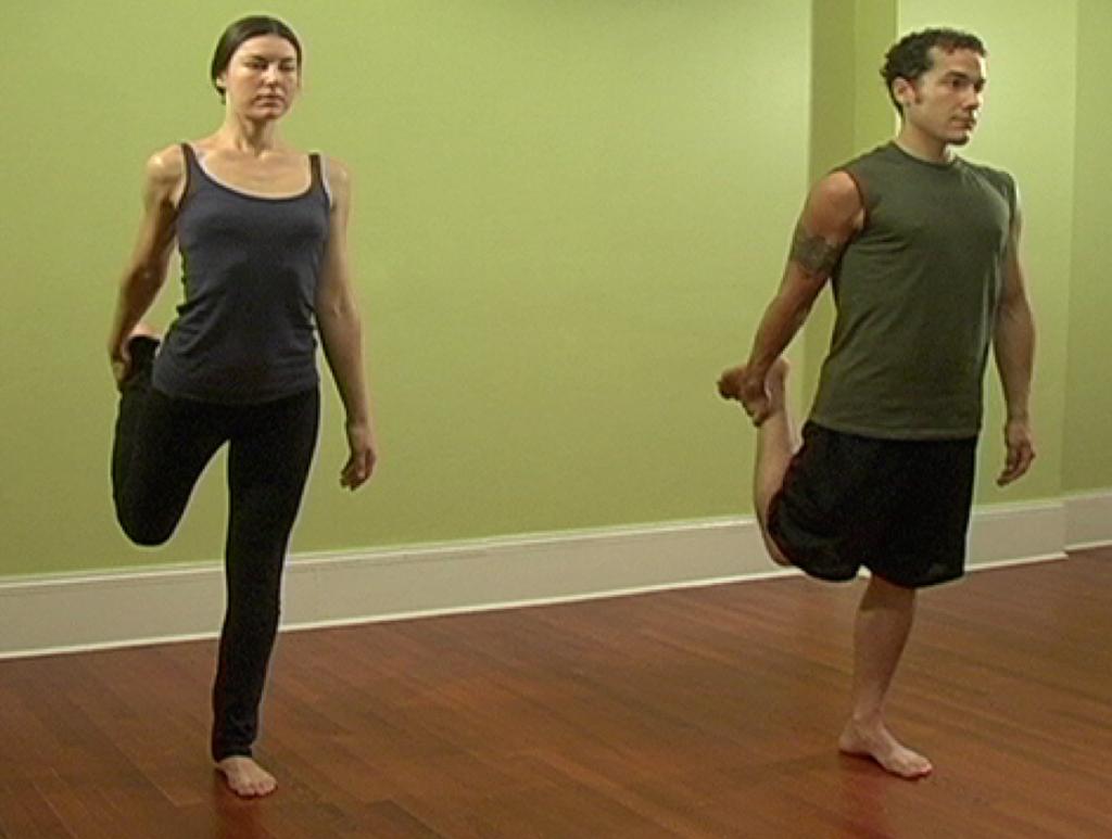STANDING PSOAS STRETCH Bend your right leg behind you and take hold of the right foot with your right hand. Bring your knees in line with one another, keeping the heel in line with your sit bone.