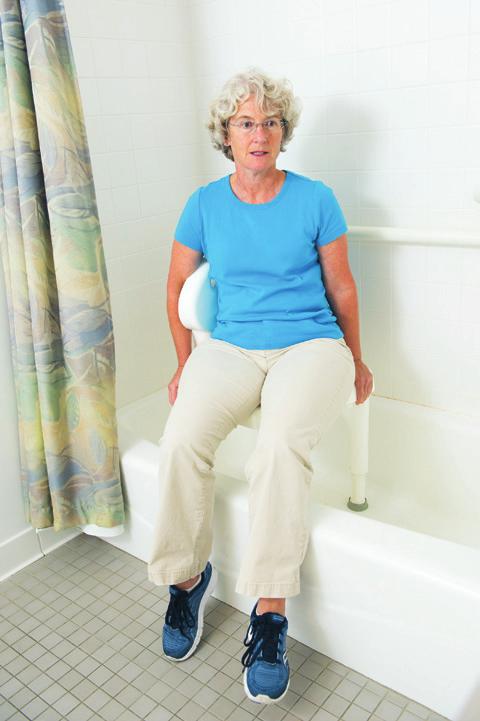 Back up to the seat/ tub threshold using your walker or crutches. 2.
