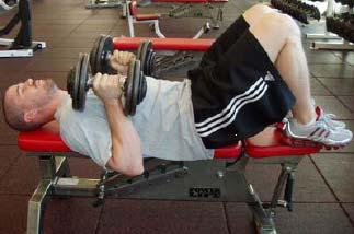 DB Bench 1. Keep lower back flat on bench by placing feet1.