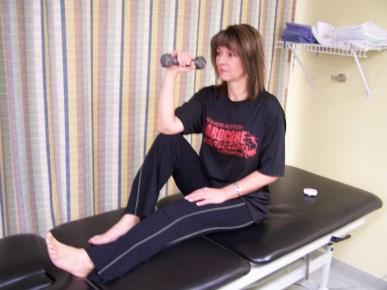 On floor, have knees bent and perform arm/shoulder slide motion