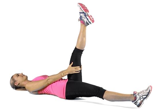 Side Stretch Stand tall with your feet wider than hip width apart and arms by your sides.