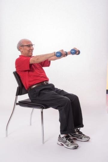 STANDING CHEST PRESS - BAND Stand with your feet hip-distance apart or sit on a chair with a straight back.