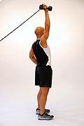 Extend the elbow towards the ceiling maintaining postural alignment Return to starting position under and repeat