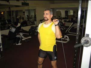 Program C1 Chest and Shoulders SHOULDERS 9. Single Arm Press (lower pulley) Muscle: Front of shoulder Resistance: ed pulley Body Connection: Thighs Adjust the pulley to the lowest position.
