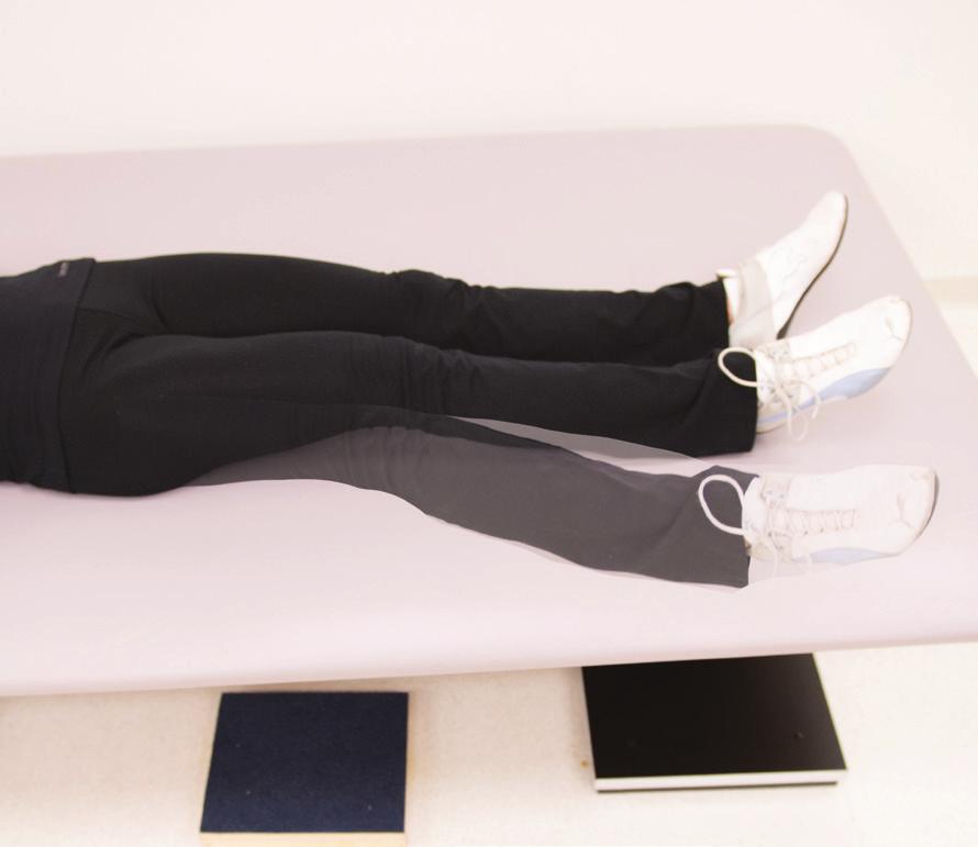 HIP ABDUCTION Lie on back, legs straight and together.