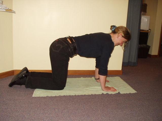 up Tighten lower abdominals belly button pulled in towards spine.