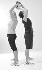 Pass the MEDICINE BALL around the side to your partner moving the ball in circular motions around you.
