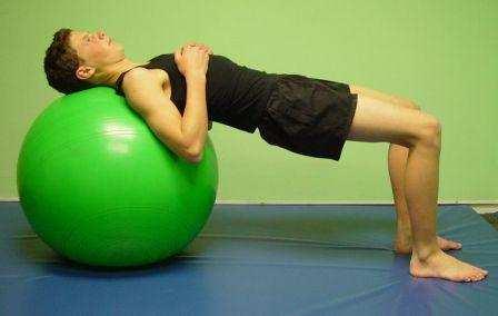 Prone on the ball Kneel in front of ball. Roll over until the ball is underneath your hips. Draw your navel towards your spine while tightening the lower abdominals and pelvic floor muscles.