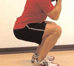 Slowly lower your hips down until you feel a stretch in your triceps.
