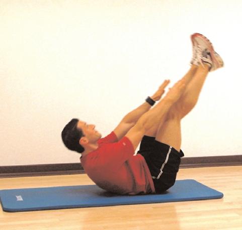 Maintain balance on your left leg and press the weights overhead. Reverse coming down.