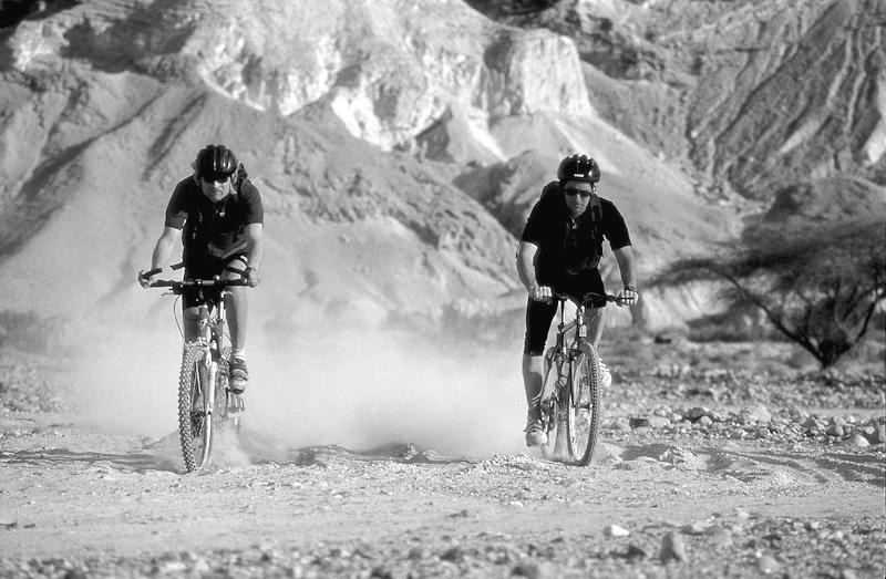 12 Mountain biking is a popular sport and one that requires a high degree of fitness. The cyclists shown here are taking part in a tour across a desert.
