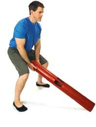 Using ViPR in a vertical position, load the hips by tilting ViPR towards you and squatting. Accelerate up through the legs and tilt ViPR forwards.