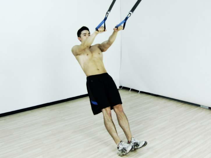 arms extended straight at shoulder height, palms down Pull the straps