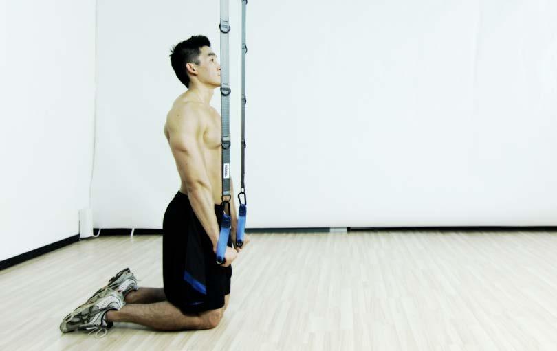 frontal raise, opposite arm in a tricep extension Face away from the