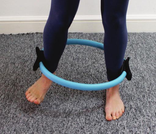 by placing the circle around your legs just above your ankles.