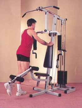 GRIP HANDLES AND PULL BENCH ARMS BACK AS FAR AS POSSIBLE WITH UPPER ARM OUT TO THE SIDES AT 45 12.