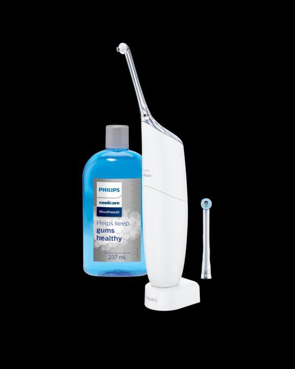 Pre-sales leaflet for United Kingdom () Rechargeable powered dental flosser - silver 2 silver nozzles 237 ml mouthwash HX8472/11 Healthier gums in 2 weeks, guaranteed* Designed for inconsistent