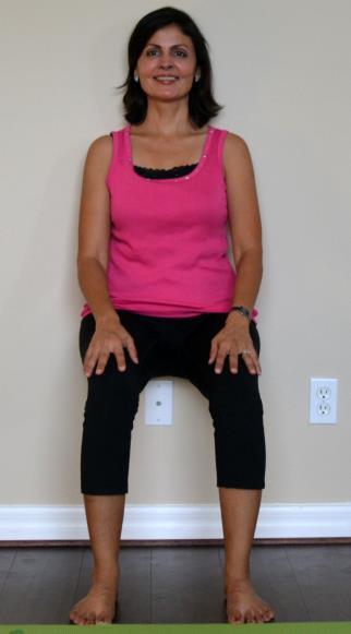 Wall Chair (Utkatasana): Start with your back against the wall, bend your knees and slowly walk your feet forward Keep the feet hip width apart and knees over your ankles Relax your shoulders and