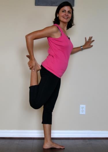 Hold on to a chair or a wall for balance and avoid locking knee of the standing leg.