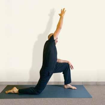 The back leg is stretching comfortably to emphasise the back leg and its hip flexor muscles, curl your tail bone underneath you before moving towards end range.